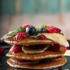 Pancake cu miere, fructe de pădure și banane