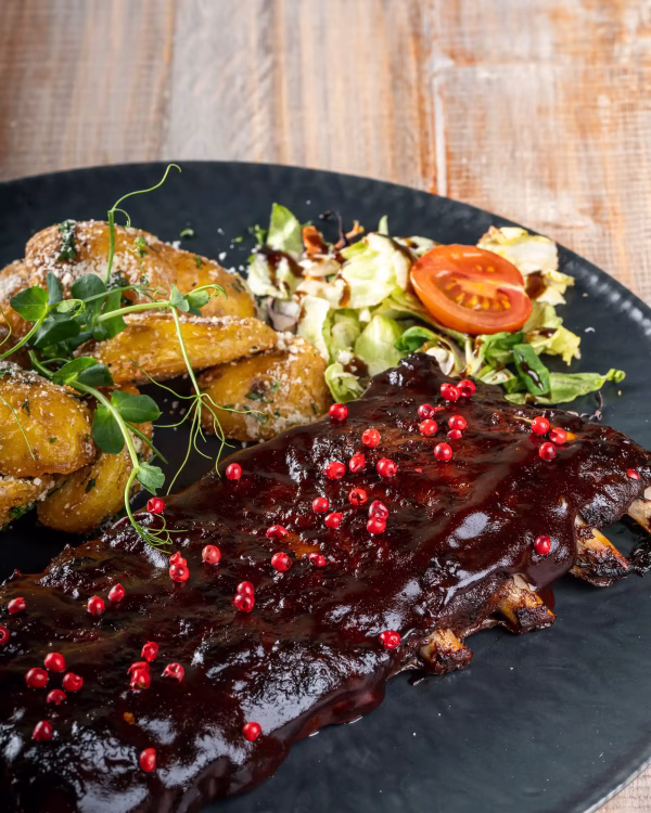 Coaste de porc la cuptor în sos Barbeque